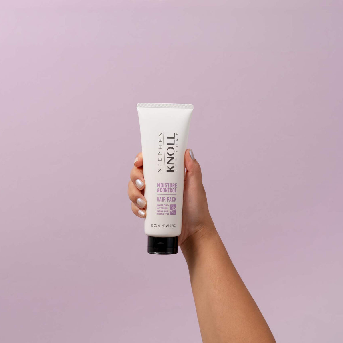 Stephen Knoll Moisture & Control Hair Pack, 220 g tube, held in hand