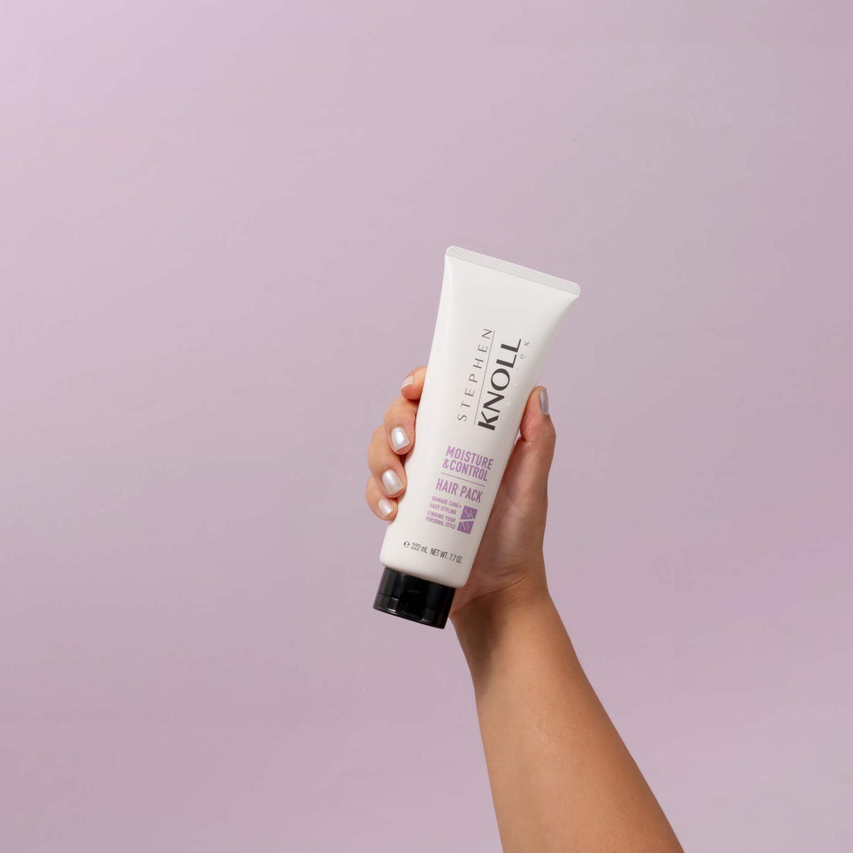 Stephen Knoll Moisture & Control Hair Pack, 220 g tube, held in hand